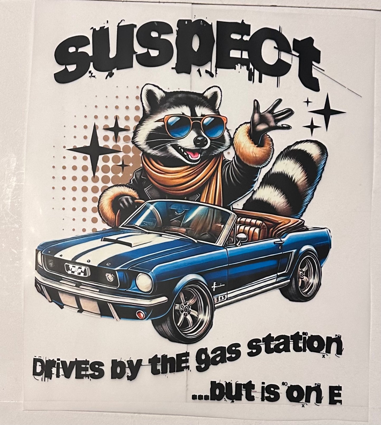 Suspect drives by gas station on E raccoon