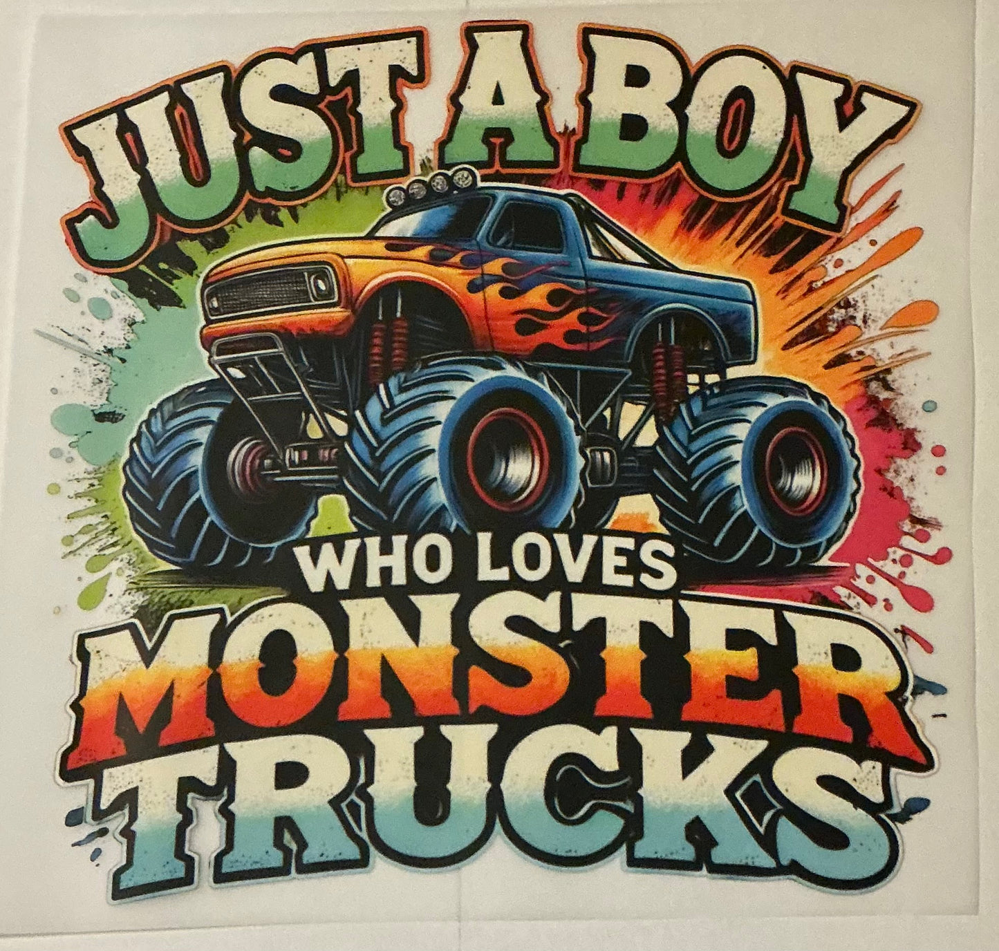 Just a boy who loves monster trucks