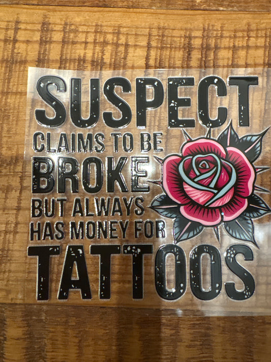 Suspect claims to be broke but always has money for tattoos