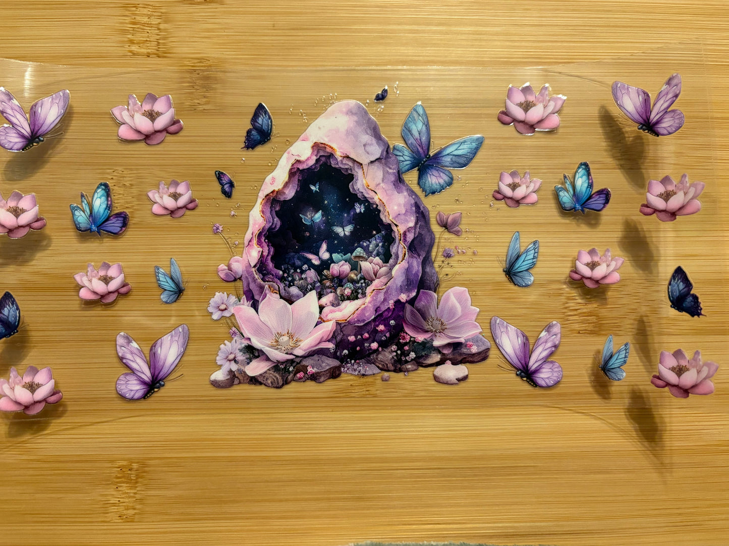 ￼Rock cave w butterflies & lotus