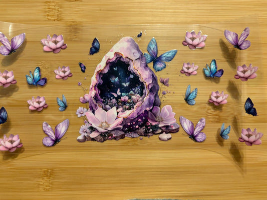 ￼Rock cave w butterflies & lotus
