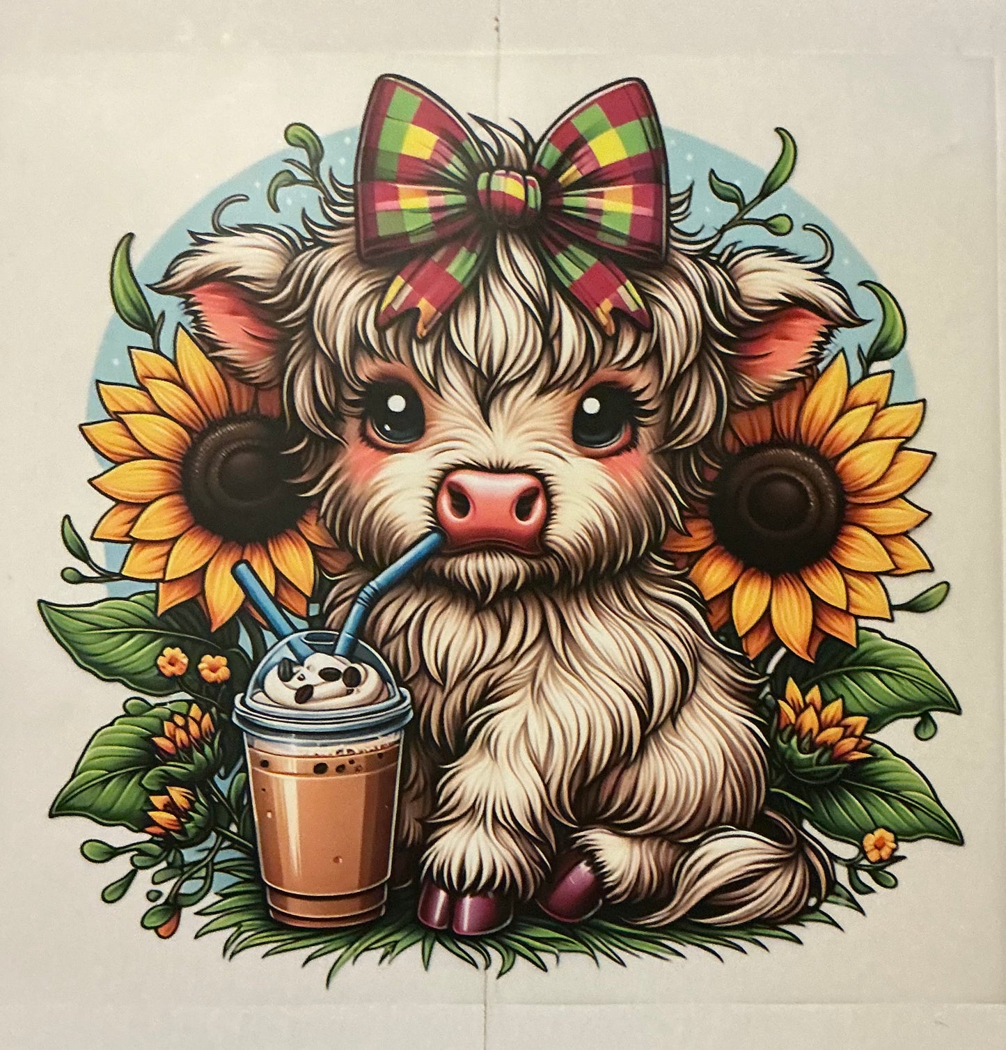 Cow with bow and coffee and sunflowers