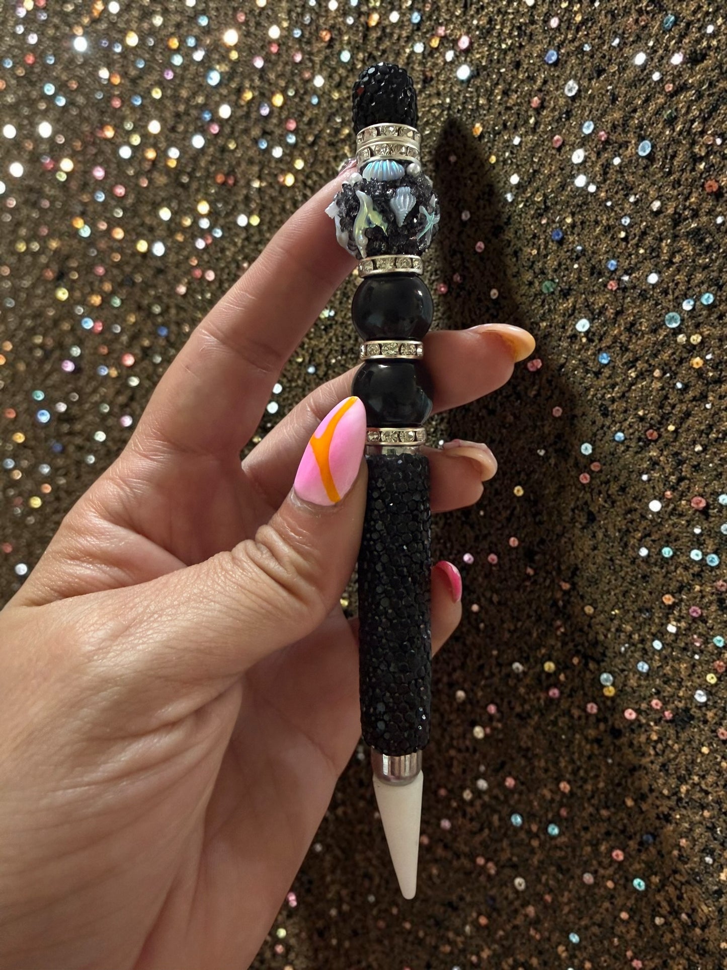 Black wax pen